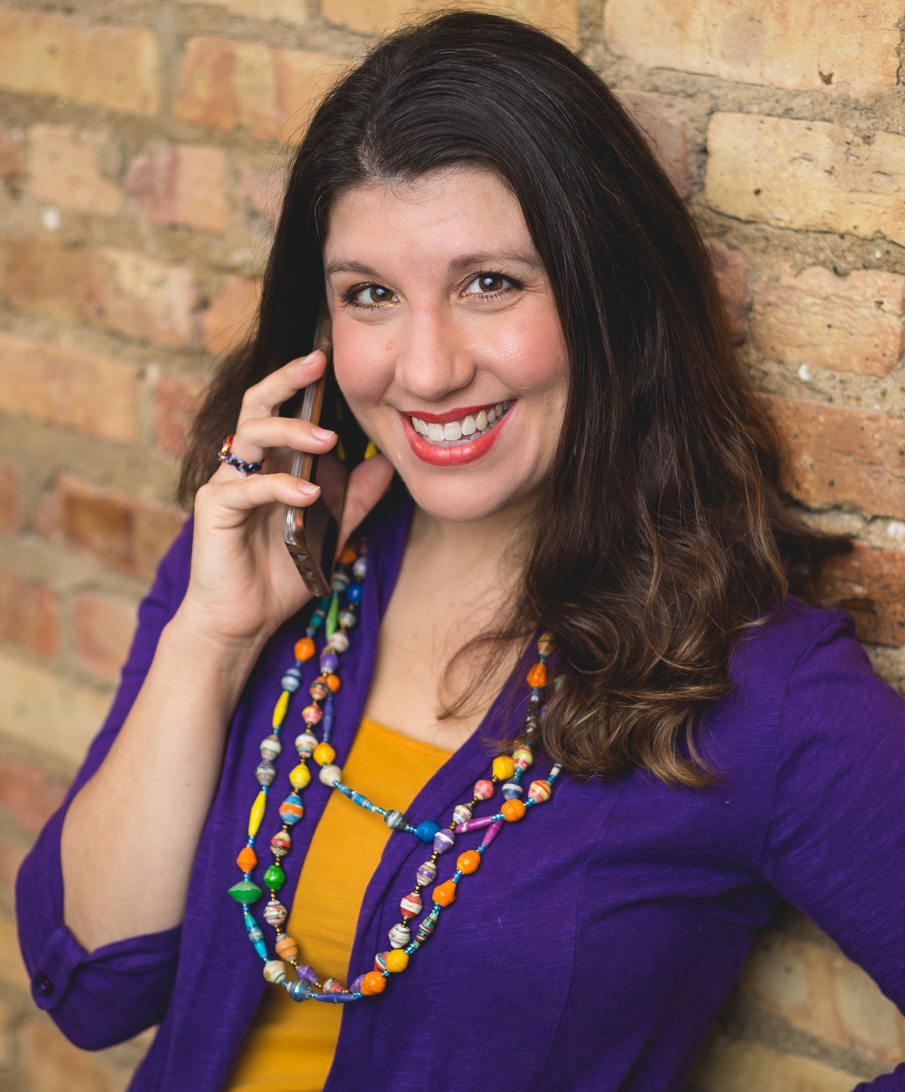 Contact Valerie image of Valerie on the phone